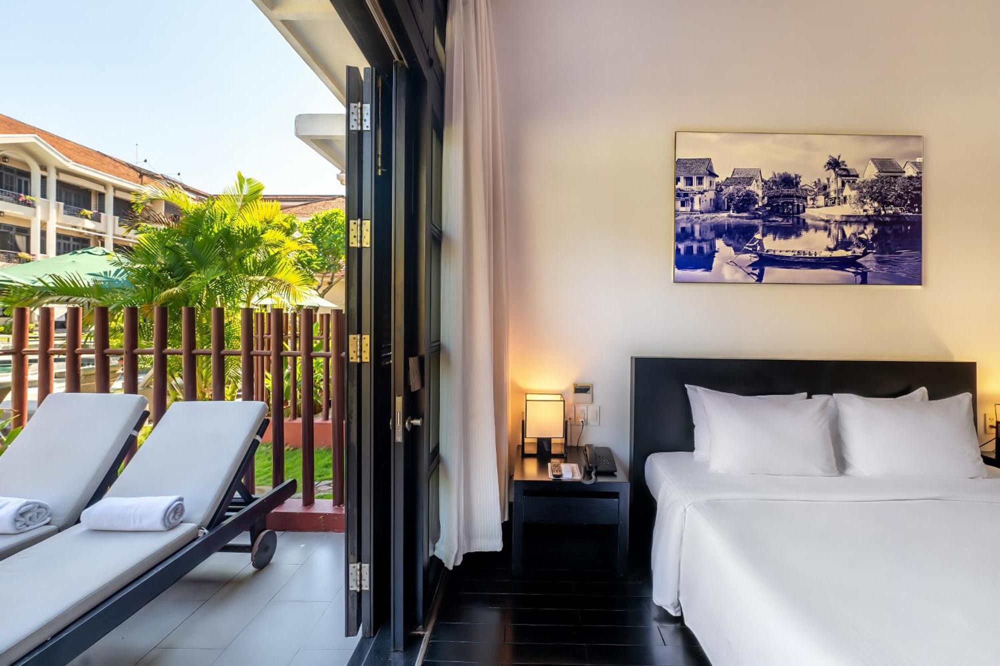 Junior Suite con Vista Piscina/Giardino